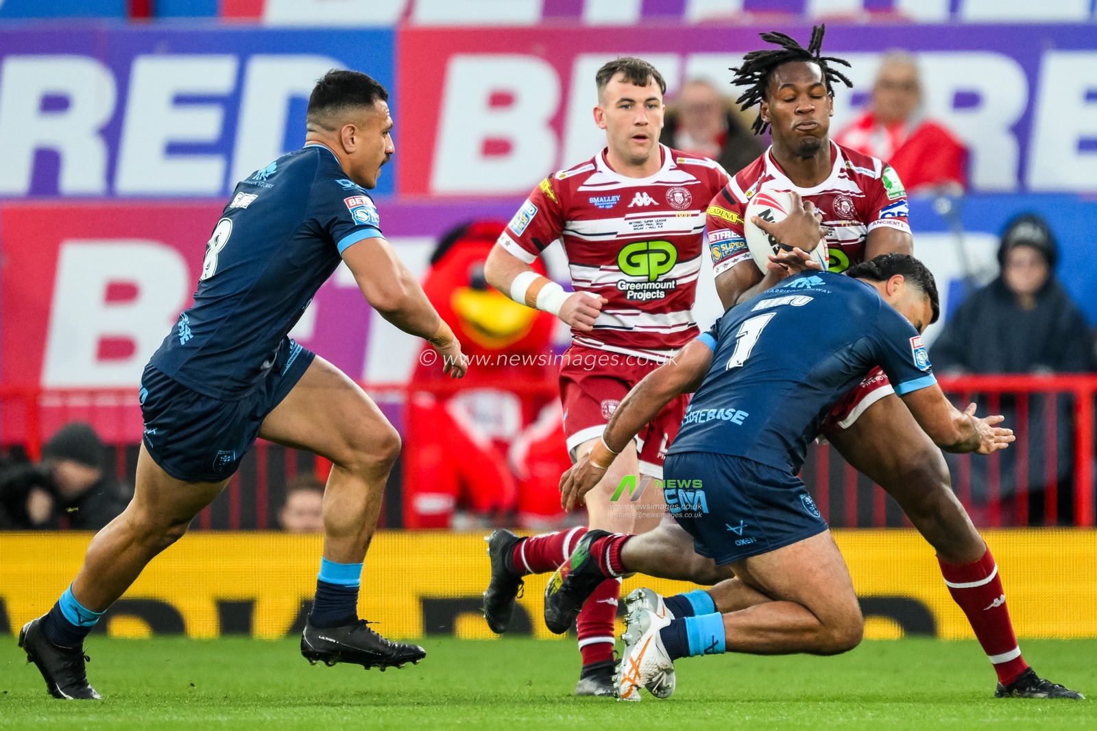 Junior Nsemba of Wigan Warriors is tackled by Peta Hiku of Hull KR during the Betfred Super League Grand Final match Wigan Warriors vs Hull KR at Old Trafford, Manchester, United Kingdom, 12th October 2024

(Photo by Craig Thomas/News Images)