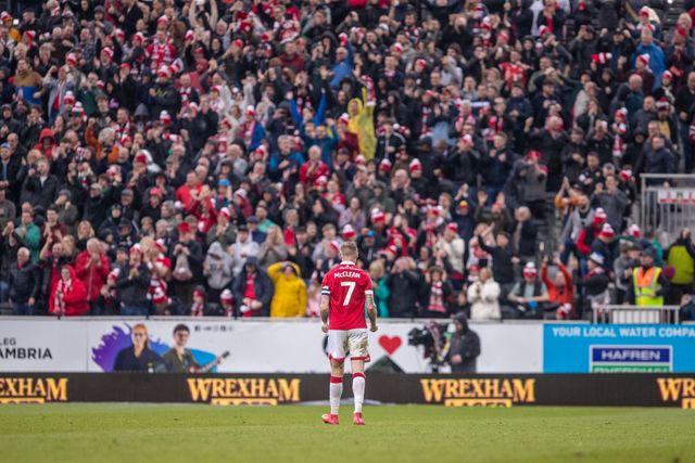 Wrexham's James McClean celebrates at full time following Wrexhamâ€™s 1-0 victory in the Sky Bet League 1 match Wrexham vs Stockport County at SToK Cae Ras, Wrexham, United Kingdom, 22nd March 2025

(Photo by Nik Mesney/News Images)