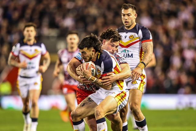 Charlie Staines of Catalans Dragons is tackled by Lachlan Lam of Leigh Leopards during the Betfred Super League match Leigh Leopards vs Catalans Dragons at Leigh Sports Village, Leigh, United Kingdom on 06 March 2026

(Photo by Alfie Cosgrove/News Images)