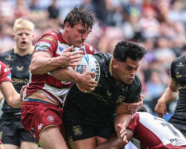 Herman Eseâ€™ese of Hull FC is tackled during the Betfred Super League Round 19 match Wigan Warriors vs Hull FC at The Brick Community Stadium, Wigan, United Kingdom, 19th July 2025

(Photo by Alfie Cosgrove/News Images)