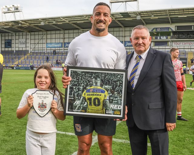 Warrington Wolves Chairman Stuart Middleton presents Paul Vaughan of Warrington Wolves with a plaque and photo on his last home game for the club during the Betfred Super League Round 25 match Warrington Wolves vs Leigh Leopards at Halliwell Jones Stadium, Warrington, United Kingdom, 6th September 2025

(Photo by Mark Cosgrove/News Images)