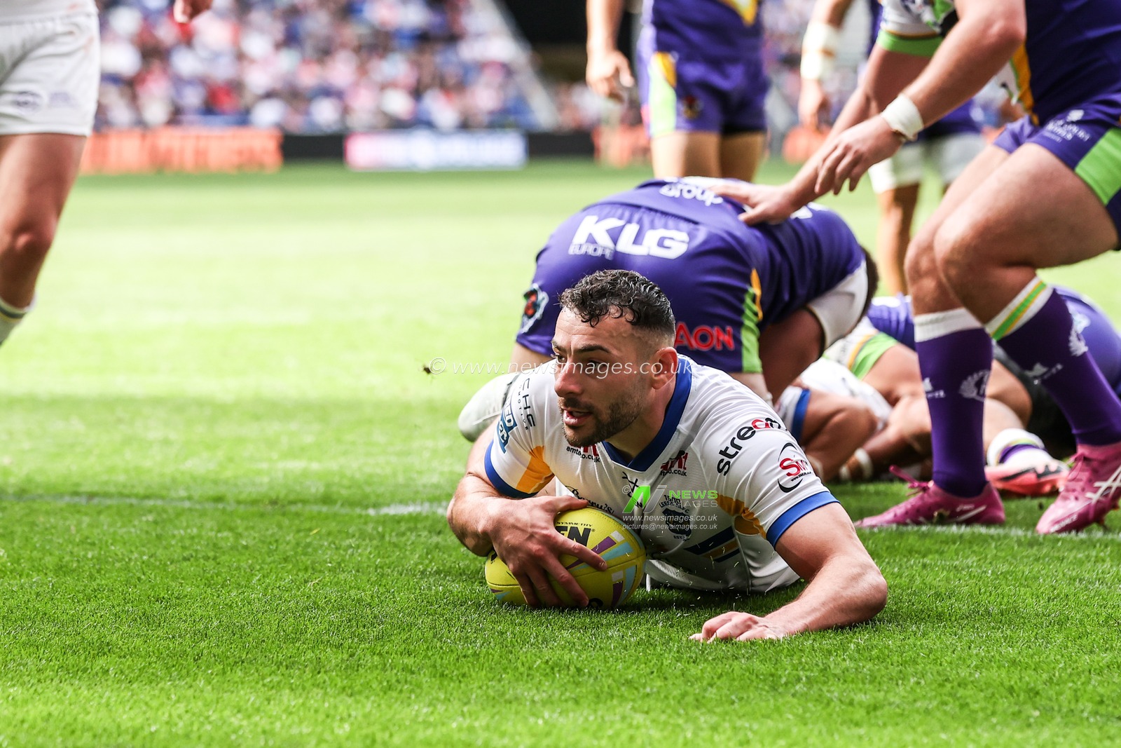 Jake Connor of Leeds Rhinos goes over for a try during the Betfred Super League Magic Weekend match Leeds Rhinos vs Bradford Bulls at Hill Dickinson Stadium, Liverpool, United Kingdom on 05 July 2026

(Photo by Alfie Cosgrove/News Images)