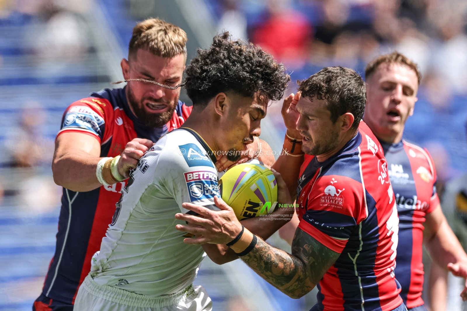 Phoenix Laulu-Togaga'e of Castleford Tigers is tackled by Jay Pitts of Wakefield Trinity during the Betfred Super League Magic Weekend match Wakefield Trinity vs Castleford Tigers at Hill Dickinson Stadium, Liverpool, United Kingdom on 05 July 2026

(Photo by Mark Cosgrove/News Images)