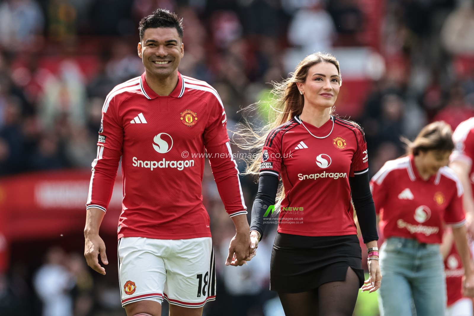 Casemiro of Manchester United is accompanied by his wife Anna Mariana Casemiro as he says goodbye to Old Trafford during the Premier League match Manchester United vs Nottingham Forest at Old Trafford, Manchester, United Kingdom on 17 May 2026

(Photo by Mark Cosgrove/News Images)