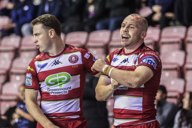 Liam Marshall of Wigan Warriors celebrates his try to make it 22-0 during the Betfred Super League Round 26 match Wigan Warriors vs Castleford Tigers at The Brick Community Stadium, Wigan, United Kingdom, 12th September 2025

(Photo by Alfie Cosgrove/News Images)