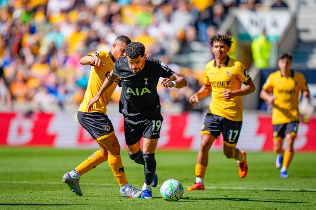 Dominic Solanke of Tottenham Hotspur goes down after being tackled by Joao Gomes of Wolverhampton Wanderers during the Premier League match Wolverhampton Wanderers vs Tottenham Hotspur at Molineux, Wolverhampton, United Kingdom on 25 April 2026

(Photo by Maynard Manyowa/News Images)
