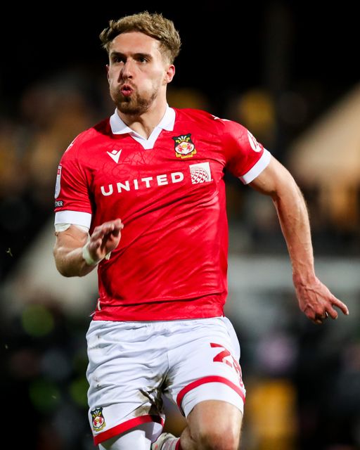 Sam Smith of Wrexham AFC in action during the Sky Bet League 1 match Cambridge United vs Wrexham at Abbey Stadium, Cambridge, United Kingdom, 1st April 2025

(Photo by Izzy Poles/News Images)