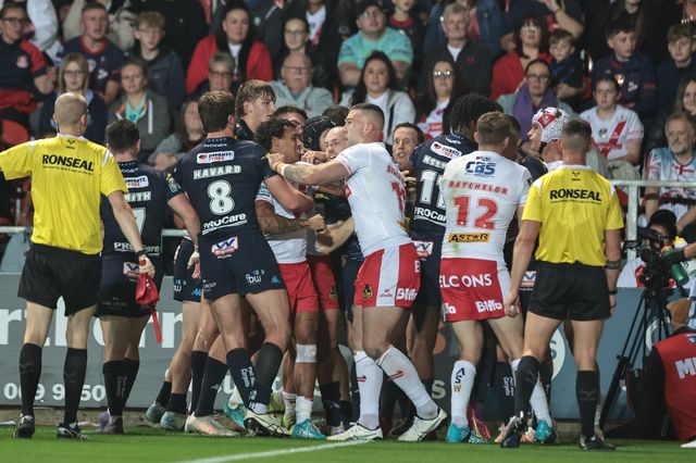 Tempers flare after Jake Wardle of Wigan Warriors goes over for a try during the Betfred Super League Round 25 match St Helens vs Wigan Warriors at Totally Wicked Stadium, St Helens, United Kingdom, 5th September 2025

(Photo by Mark Cosgrove/News Images)