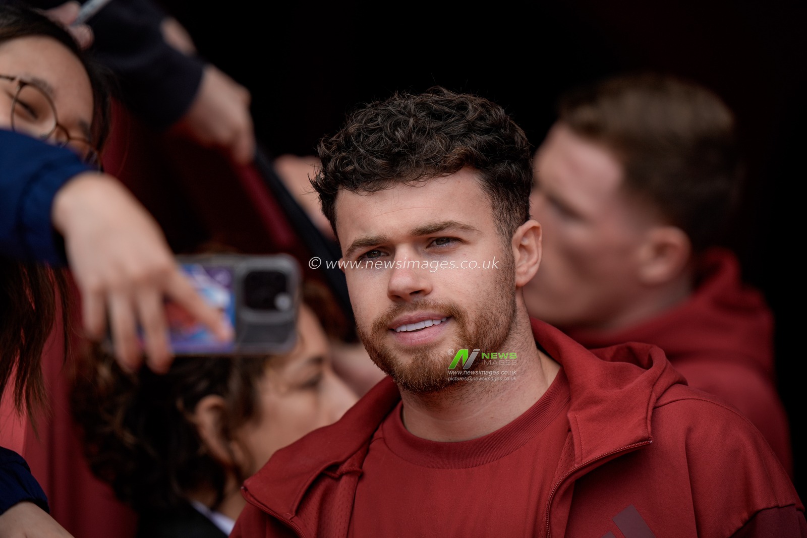 Neco Williams of Nottingham Forest takes a selfie with a fan during the Premier League match Nottingham Forest vs Newcastle Untied at City Ground, Nottingham, United Kingdom on 10 May 2026

(Photo by Maynard Manyowa/News Images)