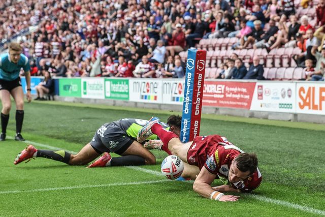 Jake Wardle of Wigan Warriors goes over for a try during the Betfred Super League round 20 match Wigan Warriors vs Catalans Dragons at The Brick Community Stadium, Wigan, United Kingdom, 25th July 2025

(Photo by Alfie Cosgrove/News Images)