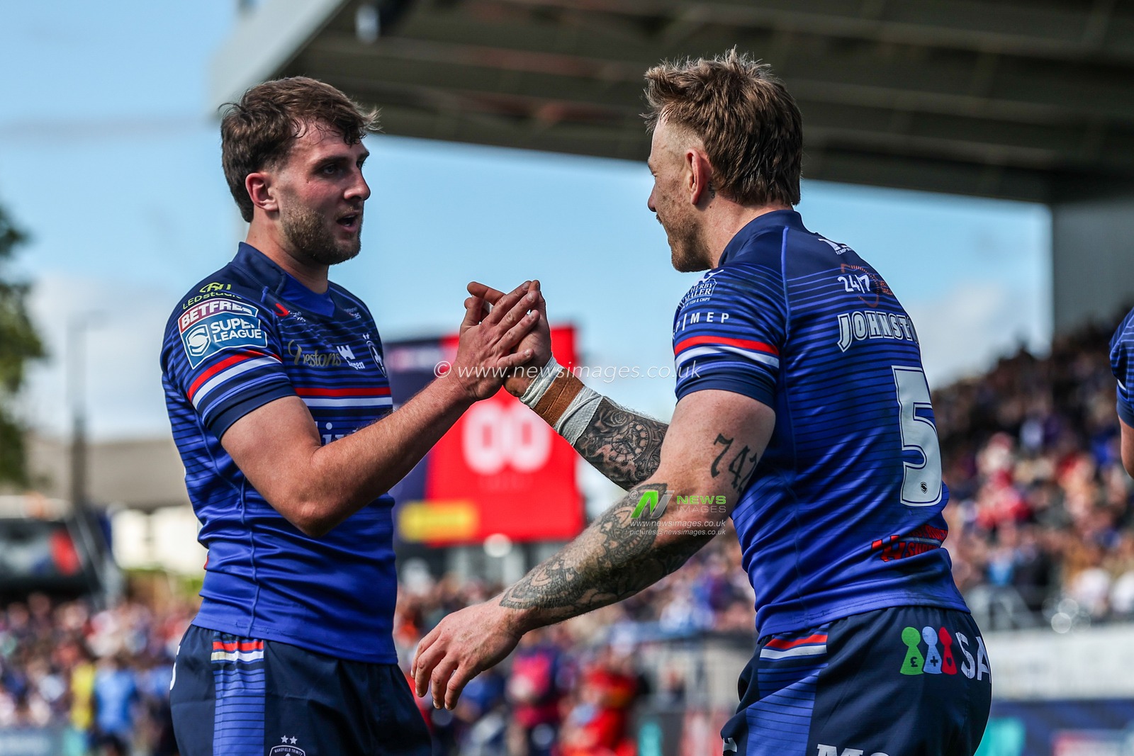 Tom Johnstone of Wakefield Trinity celebrates his try during the Betfred Super League round 8 match Wakefield Trinity vs Bradford Bulls at DIY Kitchens Stadium, Wakefield, United Kingdom on 18 April 2026

(Photo by Alfie Cosgrove/News Images)