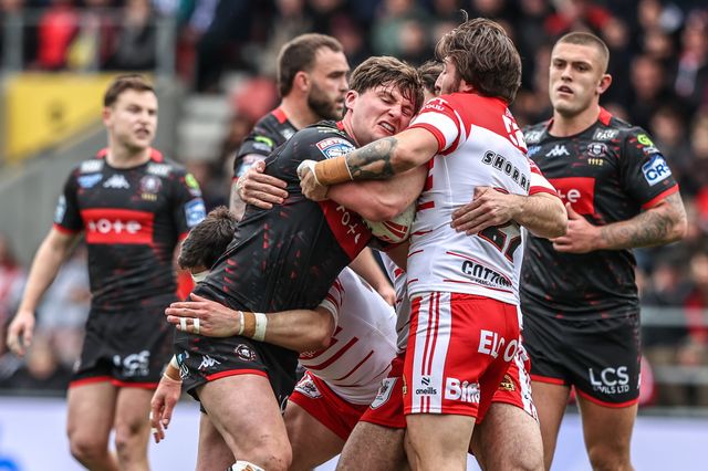 Ethan Havard of Wigan Warriors is tackled by Joe Shorrocks of St Helens during the Betfred Super League round 7 match St Helens vs Wigan Warriors at The BrewDog Stadium, St Helens, United Kingdom on 03 April 2026

(Photo by Alfie Cosgrove/News Images)