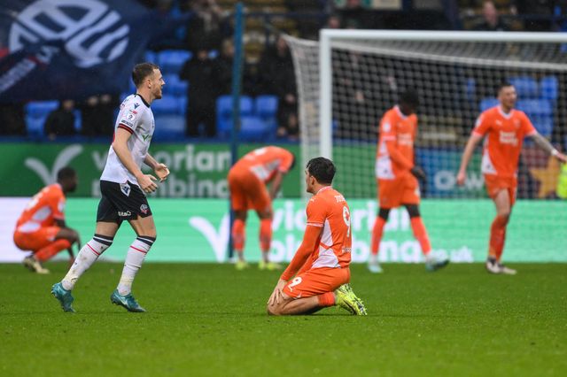 Blackpool players are dejected as Bolton score a late winner to make the score 2-1 during the Sky Bet League 1 match Bolton Wanderers vs Blackpool at Toughsheet Community Stadium, Bolton, United Kingdom, 23rd November 2024

(Photo by Craig Thomas/News Images)