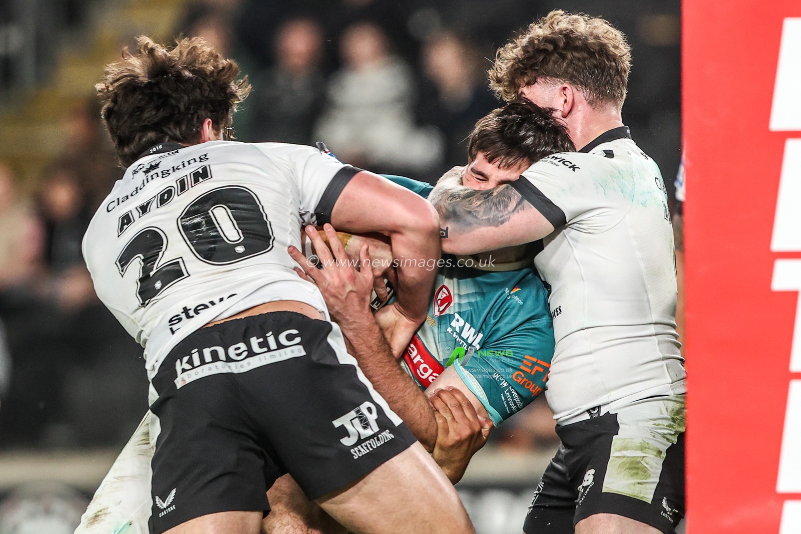 Noah Stephens of St Helens is tackled by Yusuf Aydin of Hull FC during the Betfred Super League round 8 match Hull FC vs St Helens at MKM Stadium, Hull, United Kingdom on 16 April 2026

(Photo by Alfie Cosgrove/News Images)