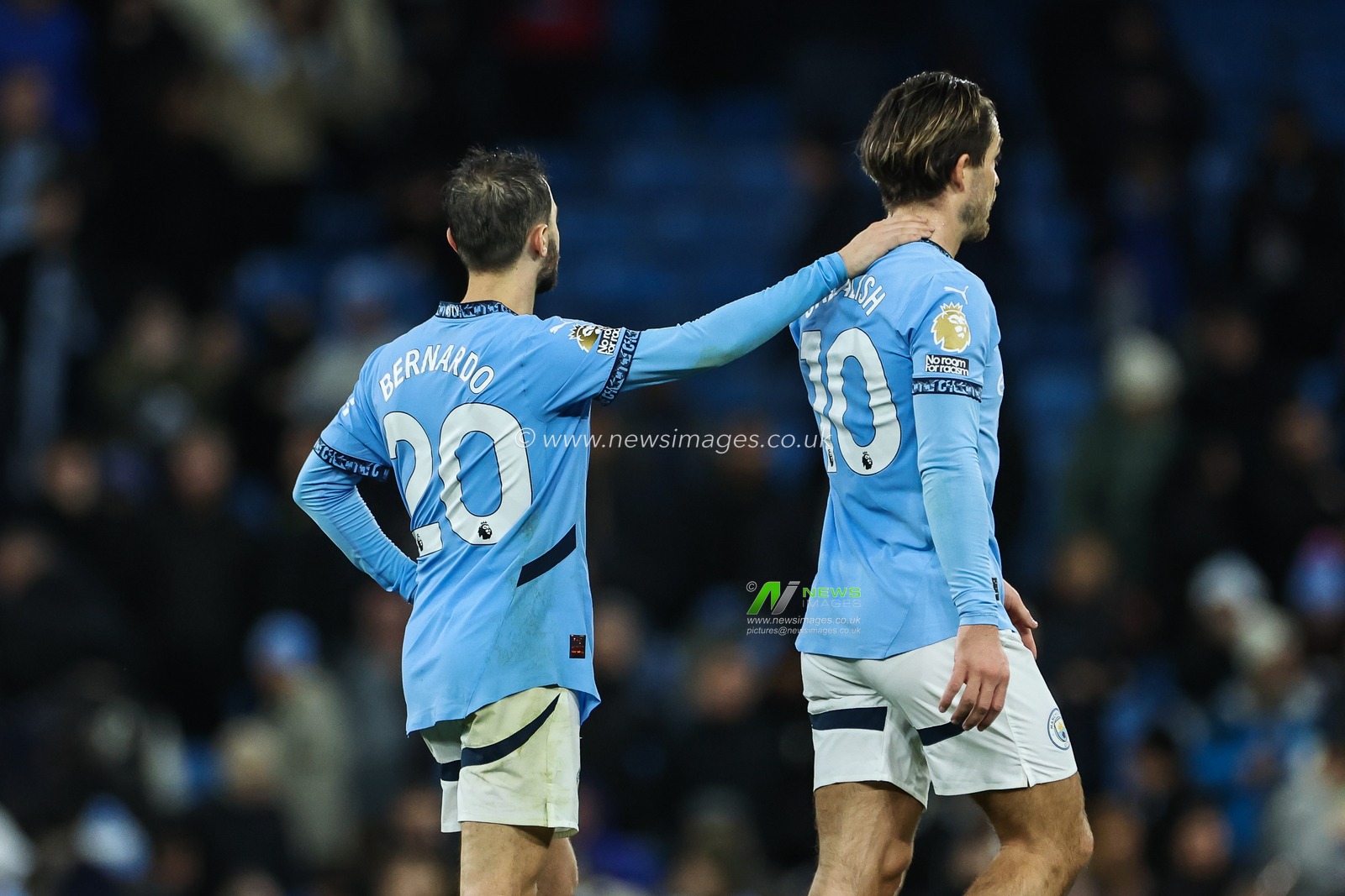 Bernardo Silva of Manchester City consoles Jack Grealish of Manchester City at the end of the Premier League match Manchester City vs Tottenham Hotspur at Etihad Stadium, Manchester, United Kingdom, 23rd November 2024

(Photo by Mark Cosgrove/News Images)