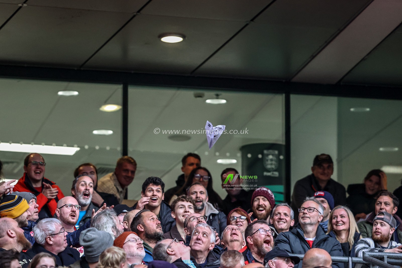 England fans entertain themselves with paper planes as they trail 6-26 during the The Ashes Series 2025 England vs Australia at Wembley Stadium, London, United Kingdom, 25th October 2025

(Photo by Alfie Cosgrove/News Images)