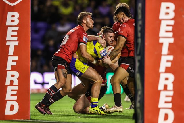 Danny Walker of Warrington Wolves is tackled during the Betfred Super League Round 24 match Warrington Wolves vs Salford Red Devils at Halliwell Jones Stadium, Warrington, United Kingdom, 29th August 2025

(Photo by Alfie Cosgrove/News Images)