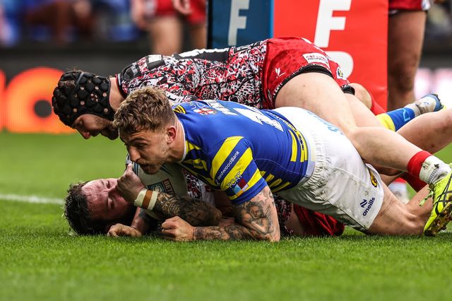 Sam Powell of Warrington Wolves goes over for a try during the Betfred Super League round 7 match Warrington Wolves vs Leigh Leopards at The Halliwell Jones Stadium, Warrington, United Kingdom on 04 April 2026

(Photo by Alfie Cosgrove/News Images)
