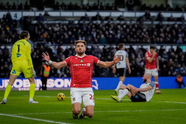 Sam Smith of Wrexham celebrates his goal to make it 1-0 during the Sky Bet Championship match Derby County vs Wrexham at Pride Park Stadium, Derby, United Kingdom, 4th January 2026

(Photo by Maynard Manyowa/News Images)

*** GER AUT SUI OUT ***