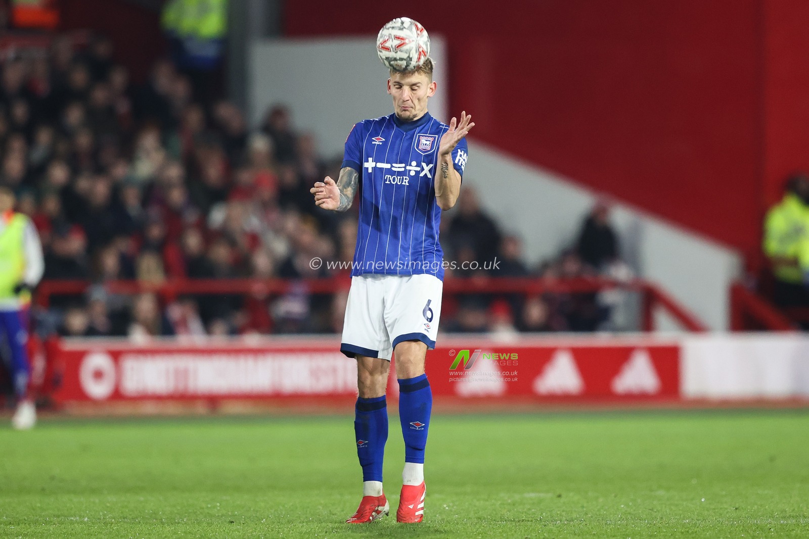 Luke Woolfenden of Ipswich Town heads the ball  during the Emirates FA Cup 5th Round match Nottingham Forest vs Ipswich Town at City Ground, Nottingham, United Kingdom, 3rd March 2025

(Photo by Alfie Cosgrove/News Images)